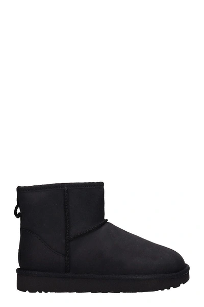 Shop Ugg Mini Classic Boots In Black