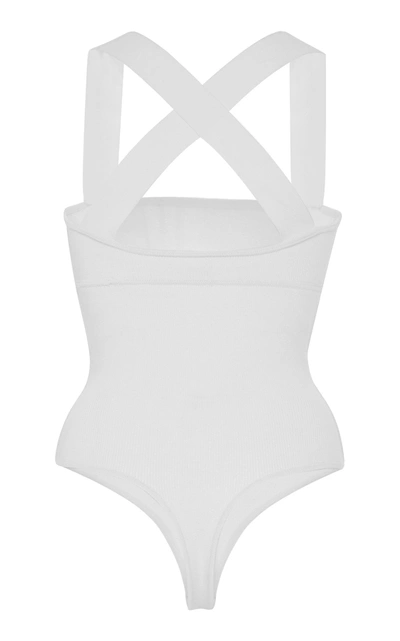 Shop Khaite Alexa Rib-knit Cross-back Bodysuit In White