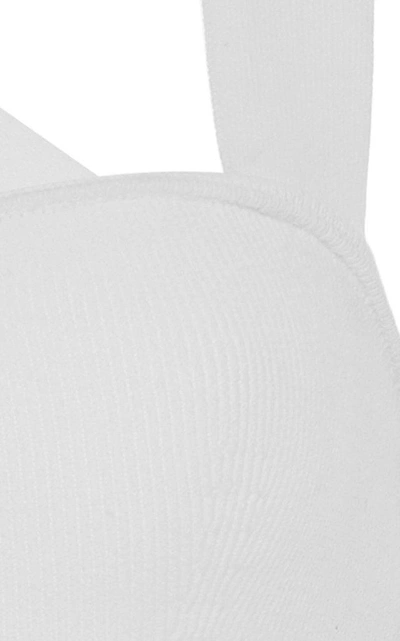 Shop Khaite Alexa Rib-knit Cross-back Bodysuit In White