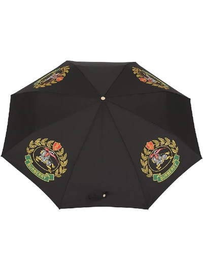Shop Burberry Crest Print Folding Umbrella - Black