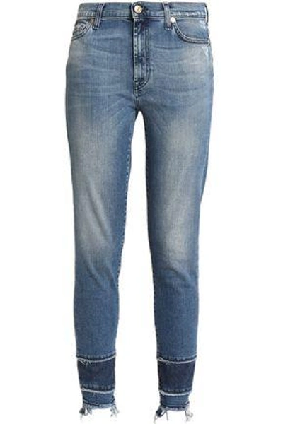 Shop 7 For All Mankind Distressed Mid-rise Skinny Jeans In Mid Denim