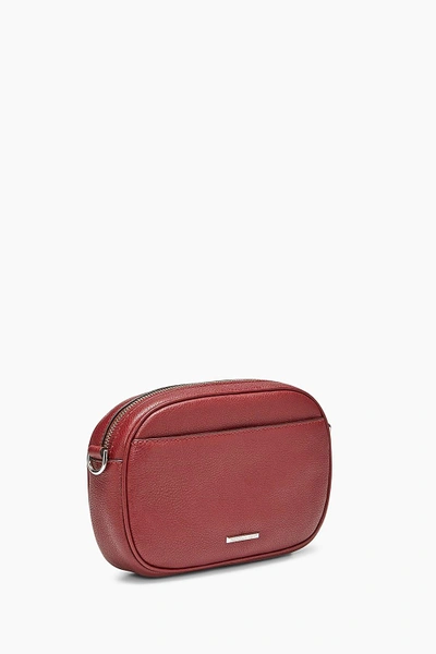 Shop Rebecca Minkoff Blythe Crossbody With Guitar Strap In Bordeaux