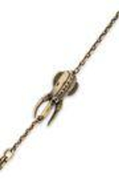 Shop Valentino Burnished Gold-tone Finger Bracelet In Brass