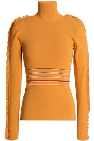 Shop Roksanda Woman Ruffle-trimmed Striped Ribbed-knit Turtleneck Top Mustard