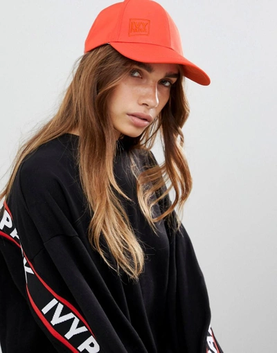 Shop Ivy Park Running Backless Cap In Orange - Orange