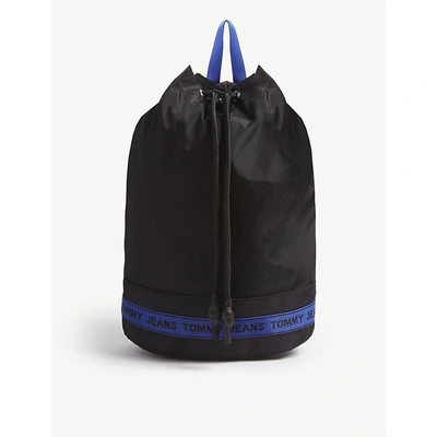 Shop Tommy Jeans Logo Tape Bucket Backpack In Black