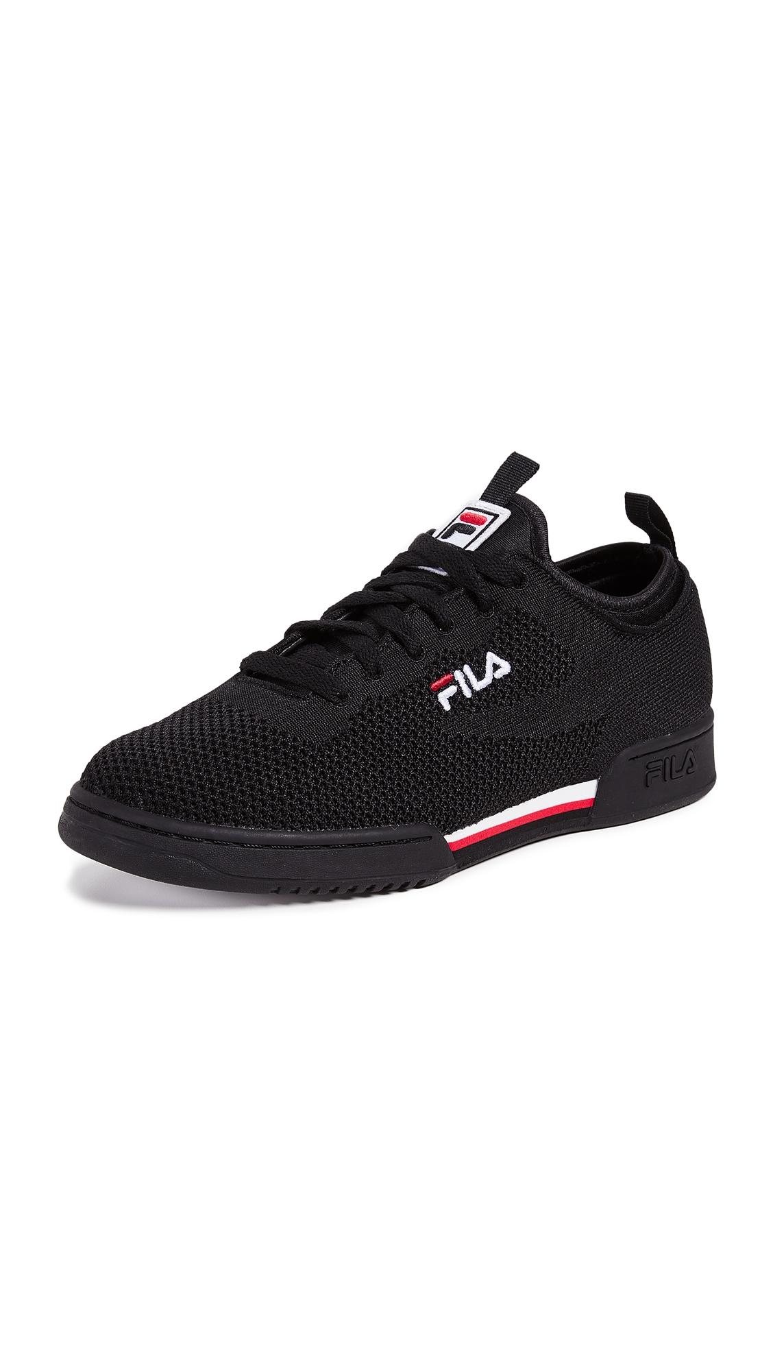 white and black fila shoes