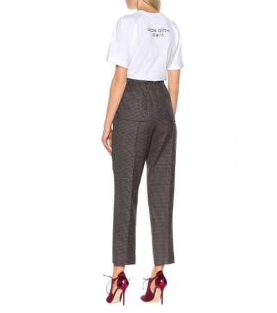 Shop Fendi Checked Stretch Wool Pants In Brown