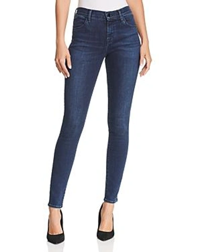 Shop J Brand 620 Mid Rise Super Skinny Jeans In Phased