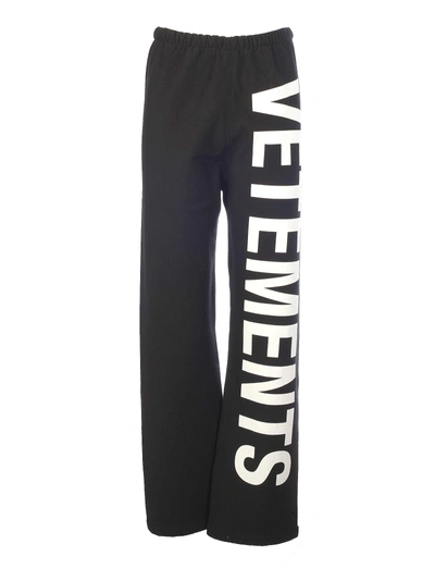 Shop Vetements Logo Track Pants In Black