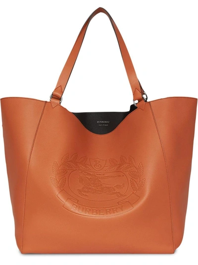 Shop Burberry Large Embossed Crest Bonded Leather Tote - Brown