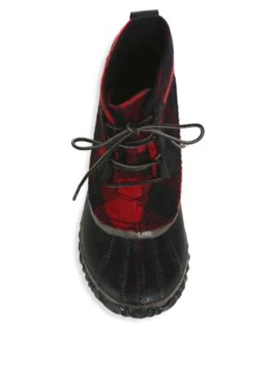 Shop Sorel Out & About Leather Booties In Black Red