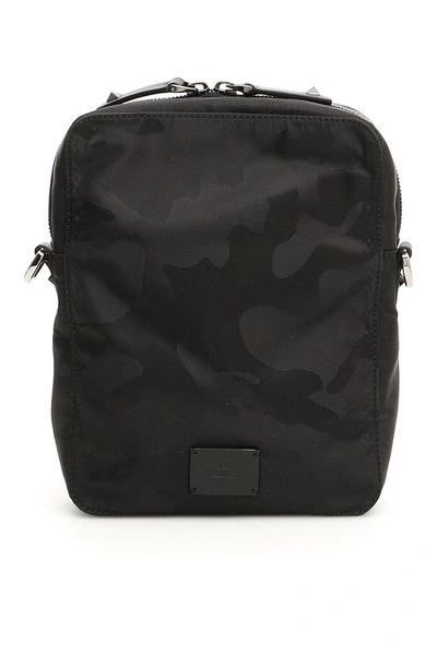 Shop Valentino Camouflage Messenger Bag In Black