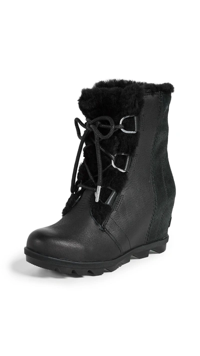 Shop Sorel Joan Of Arctic Wedge Ii Shearling Boots In Black