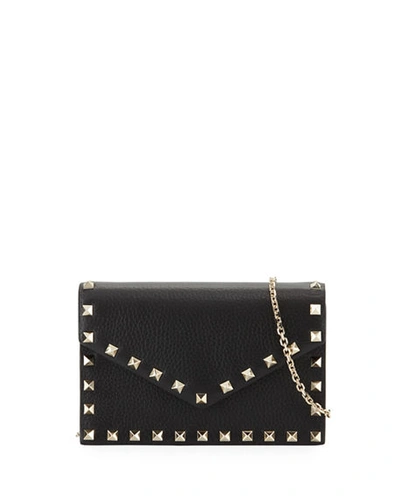 Shop Valentino Rockstud Small Leather Flap Wallet On A Chain In Black