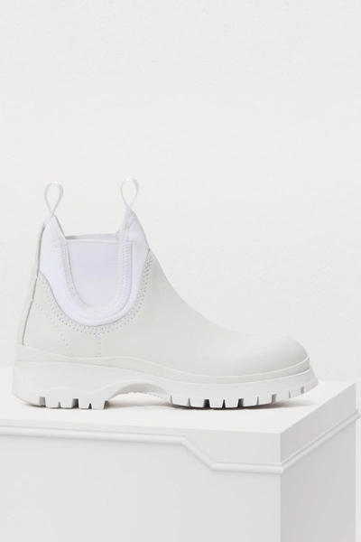 Shop Prada Brixen Ankle Boots In White
