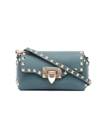 Shop Valentino Garavani Rockstud Mini Cross Body Bag In Blue