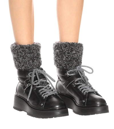 Shop Miu Miu Leather Ankle Boots In Black