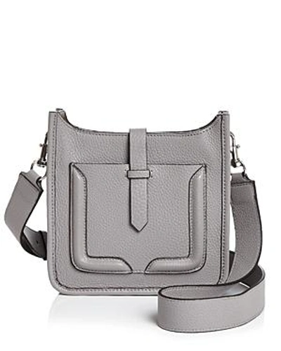 Shop Rebecca Minkoff Feed Mini Leather Crossbody In Grey Gray/silver