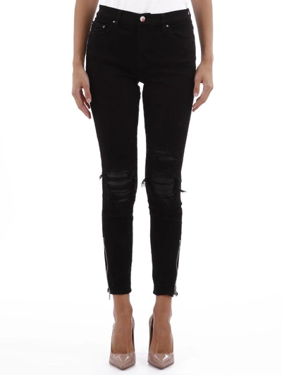 Shop Amiri Black Jeans With Leather Patch