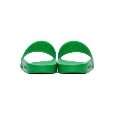 Shop Gucci Green Pursuit Pool Slides In 3023 Green.