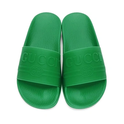 Shop Gucci Green Pursuit Pool Slides In 3023 Green.
