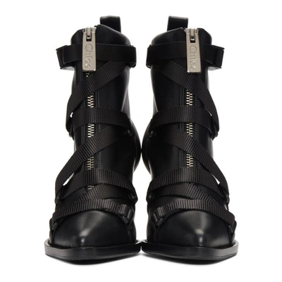 Shop Chloé Chloe Black Closed Strap Tracy Boots In 001 Black