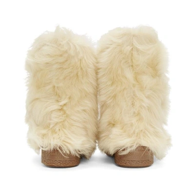 Shop Saint Laurent Beige Furry Boots In 9731 Cream