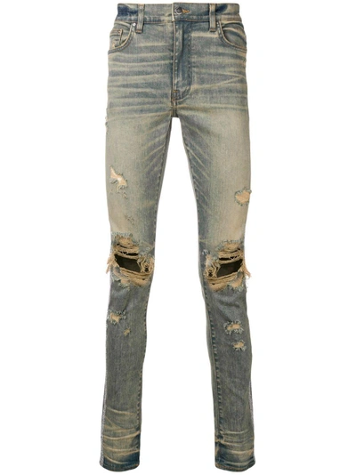 Shop Amiri Distressed Slim Jeans In Blue