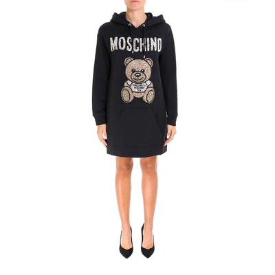 Shop Moschino Embellished Teddy Logo Hoodie Dress In Black
