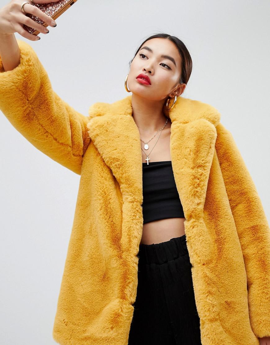 yellow faux fur coat