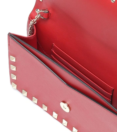 Shop Valentino Rockstud Leather Shoulder Bag In Red