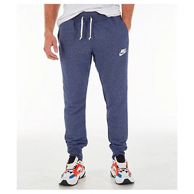 Shop Nike Men's Sportswear Heritage Club Cuffed Jogger Pants, Blue