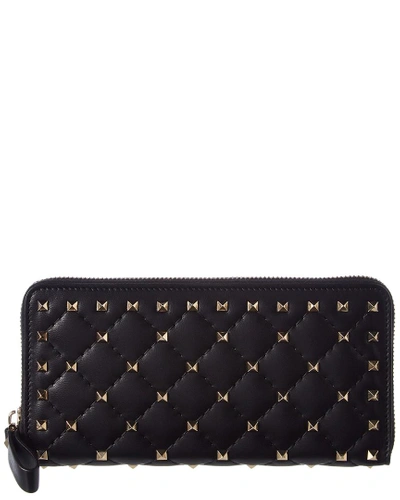 Shop Valentino Rockstud Spike Leather Zip Around Wallet In Black