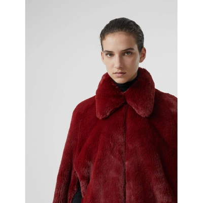 Shop Burberry Faux Fur Cape In Burgundy