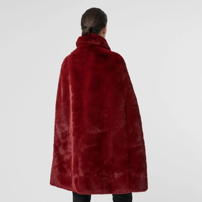 Shop Burberry Faux Fur Cape In Burgundy