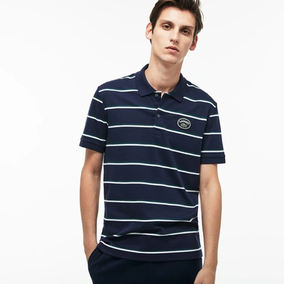 Shop Lacoste Men's Regular Fit Striped Cotton Interlock Polo In Navy Blue / White / Green