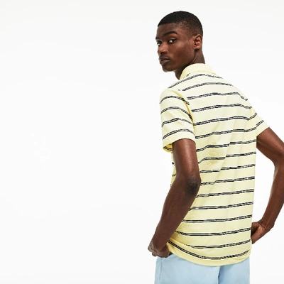 Shop Lacoste Men's Regular Fit Striped Mini Piqué Polo In Yellow / Blue / White