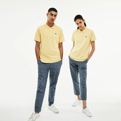 Shop Lacoste Unisex Live Ultra Slim Fit Petit Piqué Polo In Pastis Yellow