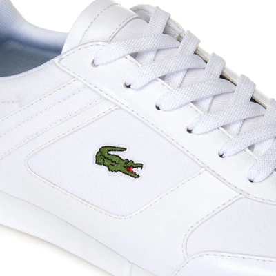 Shop Lacoste Men's Menerva Sport Textile Trainers In White/dark Blue