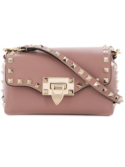 Shop Valentino Mini  Garavani Rockstud Crossbody Bag - Pink
