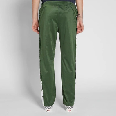 Shop Champion Reverse Weave Popper Taped Track Pant In Green