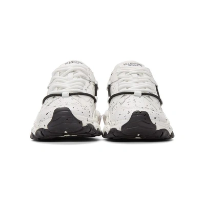 Shop Valentino White  Garavani Hand Spray Painted Bounce Sneakers In A01 White