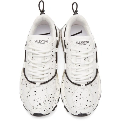 Shop Valentino White  Garavani Hand Spray Painted Bounce Sneakers In A01 White