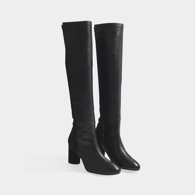 Shop Stuart Weitzman | Eloise Boots In Black Hybrid Leather
