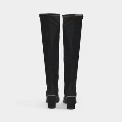 Shop Stuart Weitzman | Eloise Boots In Black Hybrid Leather