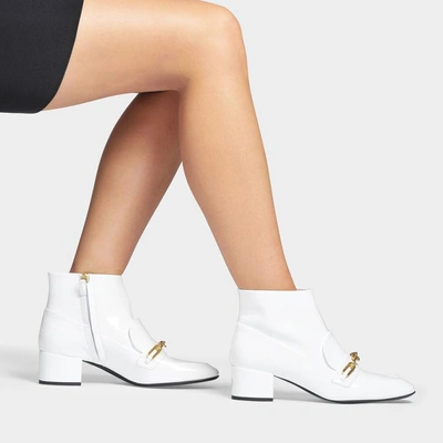 Shop Burberry | Chettle Patent Ankle Boots In White Patent Leather