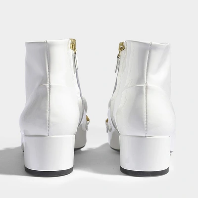 Shop Burberry | Chettle Patent Ankle Boots In White Patent Leather