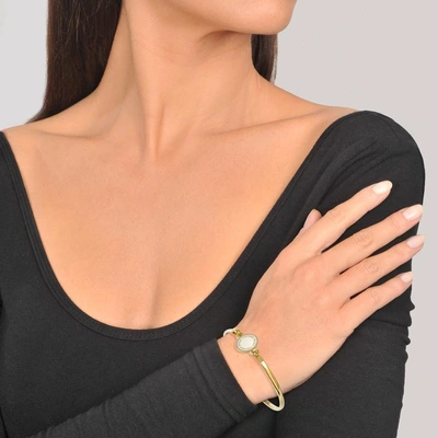 Shop Marc Jacobs Logo Disc Hinge Bracelet In Cream Brass - Jewelry Us