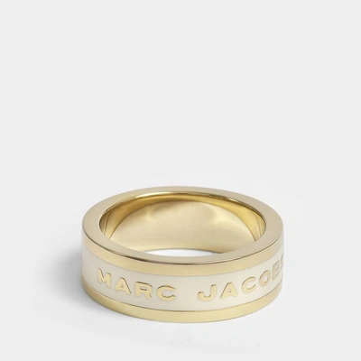 Shop Marc Jacobs Logo Disc Band Ring In Cream Brass - Jewelry Us